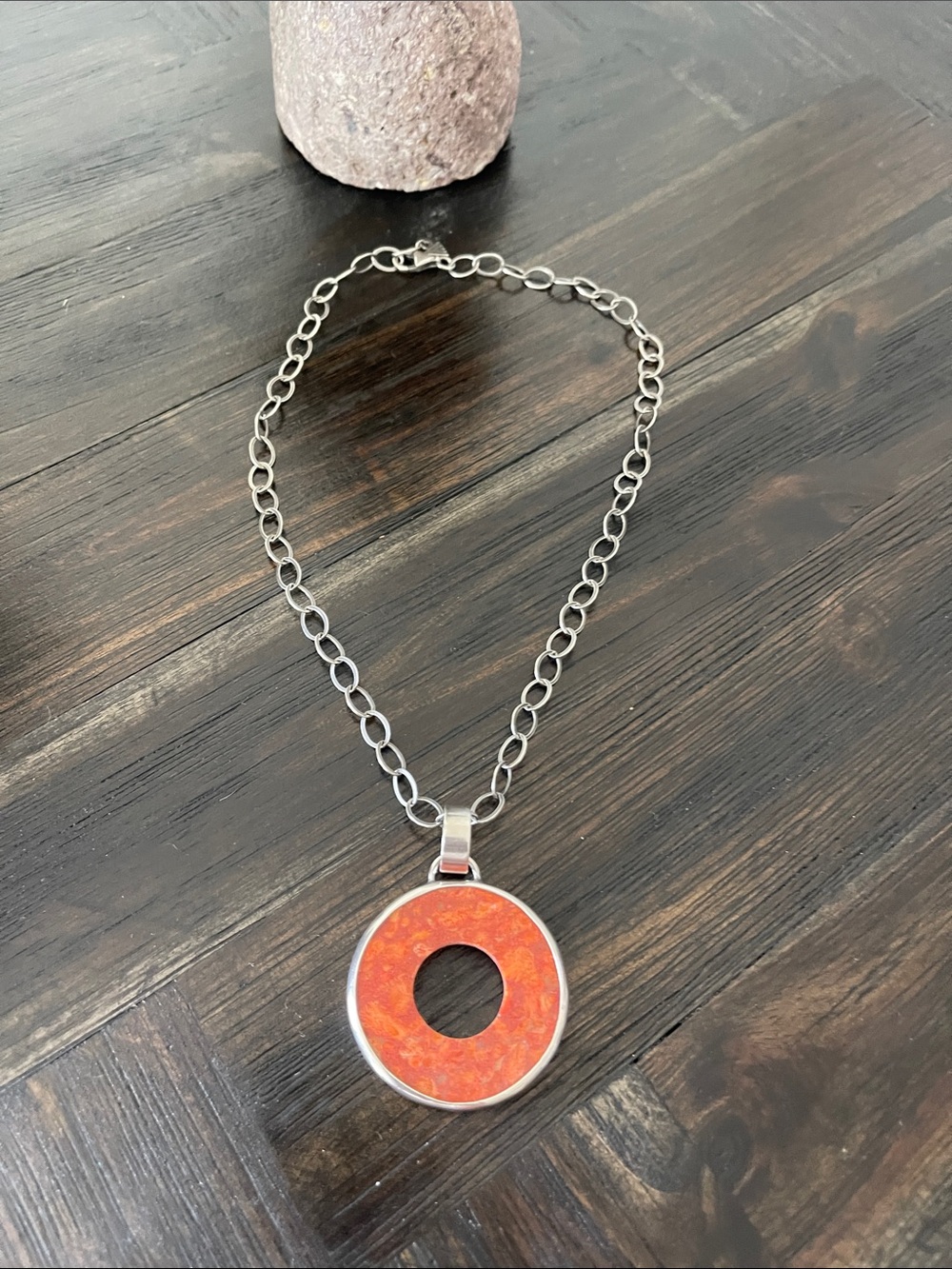 Silpada sponge coral pendant on a sterling silver necklace.